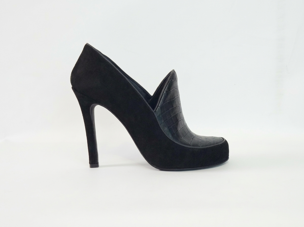 ljutikova-black-suede-pumps-back.jpg ALT: Black suede designer pump by LJUTIKOVA showing the slender stiletto heel from behind.